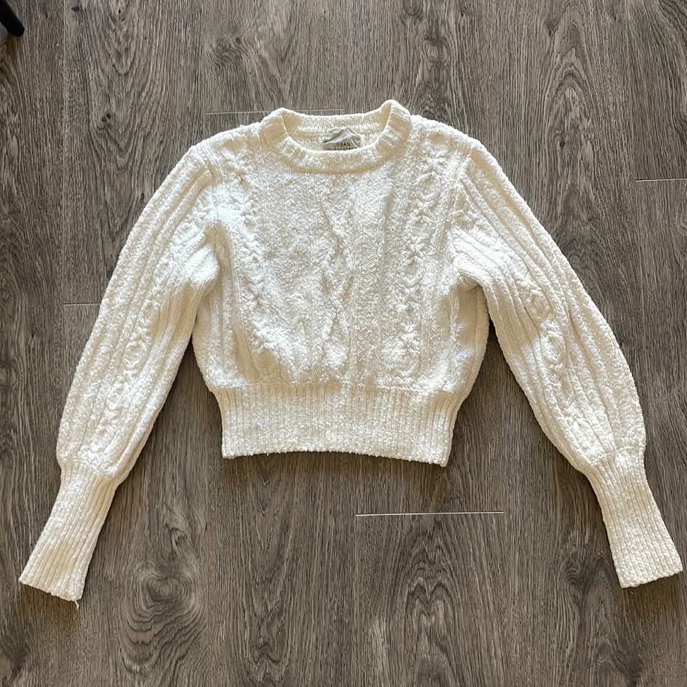 Cropped cable knit sweater